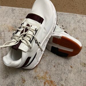 On Running White and Burgundy Sneakers